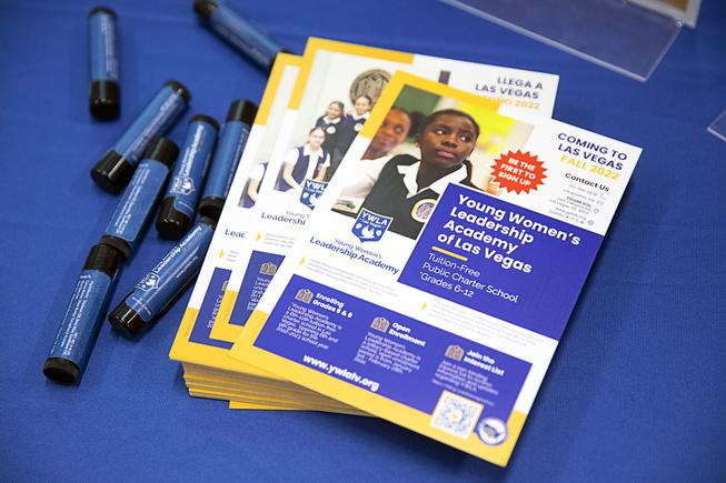 Brochures for the Young Women's Leadership Academy of Las Vegas are displayed on a table during an open house meeting at Winchester Cultural Center Thursday, Dec. 16, 2021. The all-girls charter school is scheduled to open next school year on the east side.