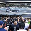 Raider fans head into Allegiant Stadium following a ribbon cutting ceremony at Allegiant Stadium before a preseason game between the Las Vegas Raiders and the Seattle Seahawks Saturday, Aug. 14, 2021.