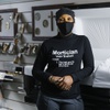 Gidden’s Memorial Chapel’s embalmer Krystal Osborne poses for a photo Tuesday, Dec. 28, 2021.