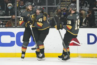 Vegas Golden Knights center Jonathan Marchessault (81) celebrates with center William Karlsson (71) after scoring during the first period of the team’s NHL hockey game against the Los Angeles Kings on Tuesday, Dec. 28, 2021, in Los Angeles. 