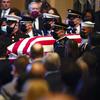 A military honor guard carries the flag-draped casket of former Senate Majority Leader Harry Reid during a memorial service at the Smith Center in Las Vegas, Saturday, Jan. 8, 2022.


