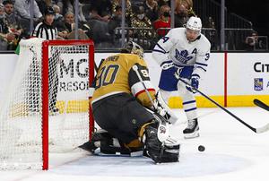 Vegas Golden Knights goaltender Robin Lehner (90) blocks a shot on goal by Toronto Maple Leafs center Auston Matthews (34) in overtime of an NHL hockey game at T-Mobile Arena Tuesday, Jan. 11, 2022.