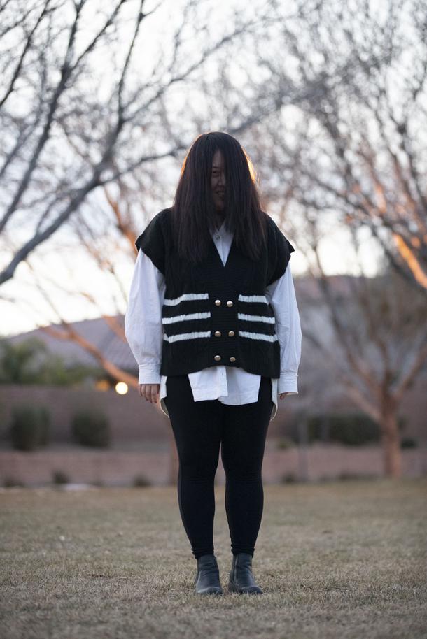 Author Axie Oh poses for a photo at Ridgebrook Park Wednesday, Jan. 12, 2022.