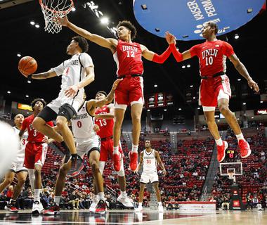 Around the second or third time San Diego State finished off a fast break with a highlight-reel dunk in the first half of Monday’s game, it became clear UNLV was in the wrong place at the wrong time ...