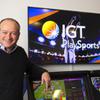 Joe Asher, president of sports betting for International Game Technology (IGT), poses in the showroom at IGT headquarters in Las Vegas Tuesday, Jan. 25, 2022.  