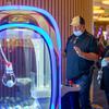 Rich Dudley and his wife Dottie, of Bakersfield, Calif., react as they win a cash prize on a claw machine by Aruze Gaming at Circa in downtown Las Vegas Thursday, Jan. 27, 2022.