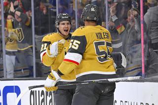 Vegas Golden Knights center Brett Howden (21) and right wing Keegan Kolesar (55) celebrate Koleser's goal against the Buffalo Sabres during the second period of an NHL hockey game Tuesday, Feb. 1, 2022, in Las Vegas.