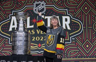 Yaya Dubner poses with the Stanley Cup during the 2022 Honda All-Star Weekend Truly Hard Seltzer NHL Fan Fair at the Las Vegas Convention Center West Hall Thursday, Feb. 3, 2022.