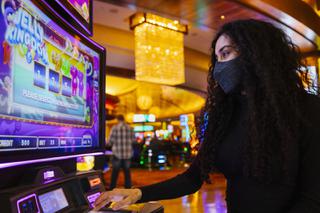 Destiny Talavera, 25, demonstrates how to play Jelly Kingdom at Red Rock Casino Thursday, Feb. 3, 2022.