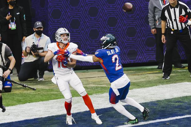 AFC wide receiver Hunter Renfrow (13) looks to catch a pass as AFC cornerback Darius Slay Jr. (2) tries to block him during the NFL Pro Bowl at Allegiant Stadium Sunday, Feb. 6, 2022.