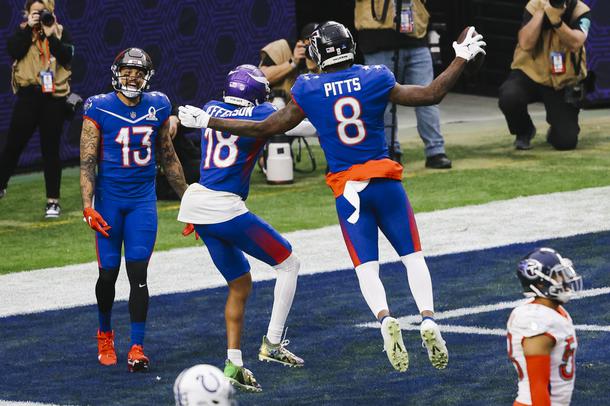 NFC tight end Kyle Pitts (8) celebrates after scoring a touchdown during the NFL Pro Bowl at Allegiant Stadium Sunday, Feb. 6, 2022.