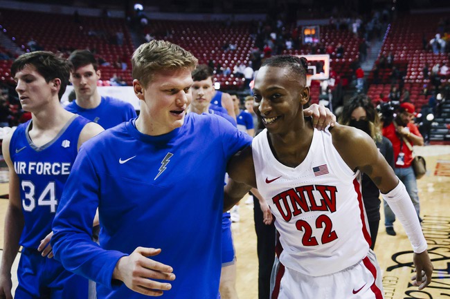 Air Force Falcons guard Jake Murphy (23) congratulates UNLV Rebels guard Josh Baker (22) after the Air Force Falcons are defeated, 78-44, during a game at the Thomas & Mack Center Tuesday, Feb. 8, 2022.