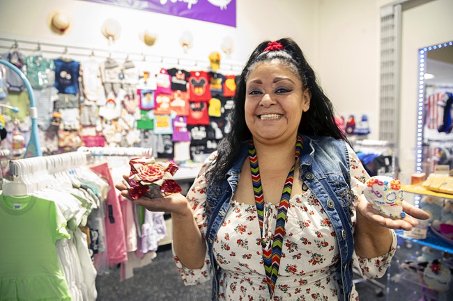Angelina Palma displays her handmade soap at her shop Angelinas Made of Soap in El Mercado, a shopping and dining area inside the Boulevard mall, Thursday, Feb.17, 2022.