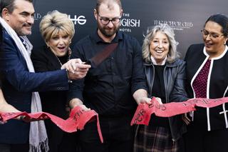 Las Vegas Mayor Carolyn Goodman, 2nd to left, Congresswoman Dina Titus, 2nd from right, and Councilwoman Olivia Diaz, right, react as Chef Todd English, left, cuts a pasta ribbon during the ribbon cutting ceremony at The English Hotel Tuesday, Feb. 22, 2022. YASMINA CHAVEZ