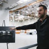 Vu Technologies CEO Tim Moore points out a rendering of a massive 140 x 20 LED screen stage, known as a LED volume, that will eventually be built at Vu Studios virtual production studio in Las Vegas Tuesday, March 1, 2022.