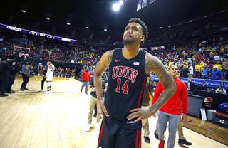UNLV Rebels forward Royce Hamm Jr. (14) leaves the court after the Rebels lose a close game, 59-56, to the Wyoming Cowboys during the Mountain West tournament at the Thomas & Mack Center Thursday, March 10, 2022. 