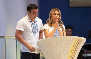 Jenny Arata of Ukraine and her husband Vittorio speak during a special Mass for Ukraine at the Holy Spirit Catholic Church Sunday, March 13, 2022.