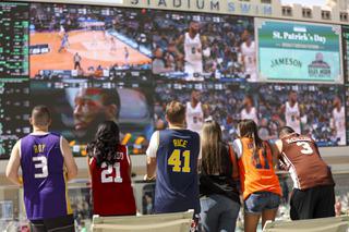 People watch NCAA college basketball tournament games during March Madness at Circa Thursday, March 17, 2022.