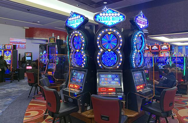 A view of Vegas-themed slot machines at Resorts World New York City hotel-casino in Queens Saturday, April 9, 2022.