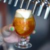 A bartender pours a glass of 6 Feet Under at the Lovelady Brewing Company in downtown Henderson Thursday, April 14, 2022.