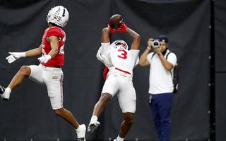 UNLV Rebels wide receiver Zyell Griffin (3) pulls in a pass in the end zone over defensive back Cameron Oliver (25) during the UNLV Football Spring Showcase at Allegiant Stadium Saturday, April 23, 2022.