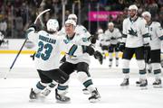 San Jose Sharks right wing Timo Meier (28) celebrates after Thomas Bordeleau (23) scored against the Vegas Golden Knights during a shootout in an NHL hockey game Sunday, April 24, 2022, in Las Vegas.