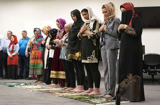 Members of the Muslin community pray during a Night of Power event at the Metro Police Summerlin Area Command Wednesday, April 27, 2022.
