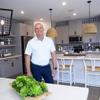 Klif Andrews, division president with Tri Pointe Homes, poses in the kitchen of a model home in the Inspirada community of Henderson Thursday, April 28, 2022.