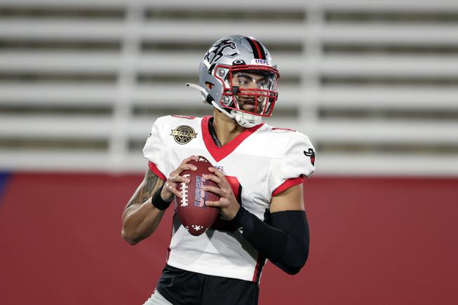 Tampa Bay Bandits quarterback Jordan Ta'amu (10) looks to pass against the Pittsburgh Maulers during the second half of a USFL football game Monday, April 18, 2022, in Birmingham, Ala.