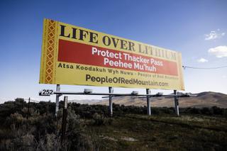 A billboard sign is posted by the People of Red Mountain to protest the proposal of the Thacker Pass Lithium Mine by Lithium Nevada Corp. in Orovada, Nevada Tuesday, April 26, 2022.
