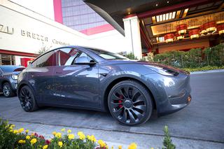 A Tesla Model Y, one of the vehicles available from EVolve Tesla Rentals, is shown in a Resorts World porte cochere Tuesday, May 3, 2022.