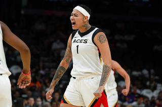 Las Vegas Aces' Kierstan Bell (1) celebrates during the second half of the team's WNBA basketball game against the Phoenix Mercury on Friday, May 6, 2022, in Phoenix.