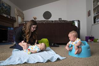 Taylor Phelps takes care of her seven-month-old twin boys Damyan, left, and Adryan at her mothers home Wednesday, May 11, 2022. The twins need a high-calorie baby formula that can be hard to find recently due to a baby formula shortage.