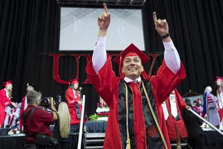 Ian Alvirez celebrates during UNLV graduation ceremonies for the Class of 2022 at the Thomas & Mack Center Saturday, May 14, 2022.