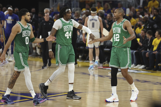 Boston Celtics forward Jayson Tatum (0) celebrates with center Robert Williams III (44) and center Al Horford (42) during the first half of Game 1 of the NBA Finals against the Golden State Warriors in San Francisco, Thursday, June 2, 2022.


