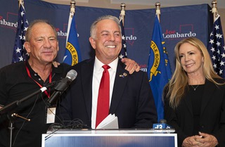 Clark County Sheriff and Republican candidate for Nevada Governor Joe Lombardo shares the stage with former Sheriff Bill Young and his wife Donna as he gives a victory speech during an election watch party Tuesday, June 14, 2022.