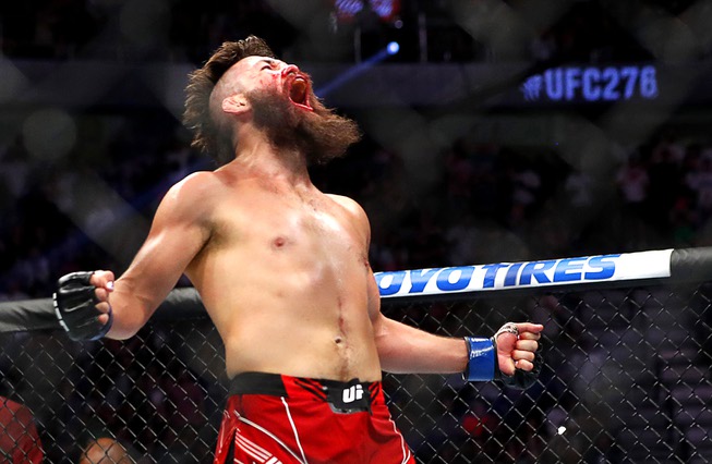 Welterweight fighter Bryan Barberena celebrates after stopping Robbie Lawler in the second round during UFC 276 at T-Mobile Arena Saturday July 2, 2022. Barberena won by TKO. 