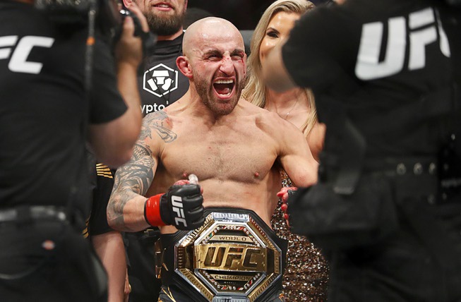 UFC featherweight champion Alexander Volkanovski celebrates after defeating Max Holloway during UFC 276 at T-Mobile Arena Saturday July 2, 2022. Volkanovski retained his title by unanimous decision. 