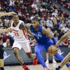 Dallas Maverick Jaden Hardy (3) drives to the basket past Chicago Bulls defenders during the 2022 NBA Summer League at the Thomas & Mack Center Friday, July 8, 2022.