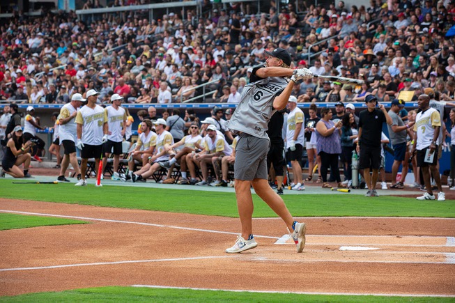 AJ Cole (6) of the Las Vegas Raiders competes in the home run derby before the start of the annual Battle 4 Vegas charity softball game at the Las Vegas Ballpark Monday July, 18, 2022.