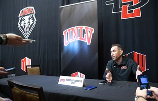 Marcus Arroyo, UNLV head football coach, talks with reporters during the Mountain West Media Day at Mandalay Bay Wednesday, July 20, 2022.