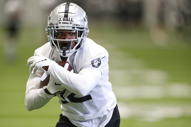 Las Vegas Raiders wide receiver Justin Hall carries the ball ...