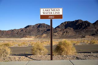 A sign shows the 2002 water line at Lake Mead Saturday, August 6, 2022.