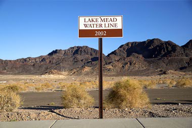 A sign shows the 2002 water line at Lake Mead Saturday, August 6, 2022.