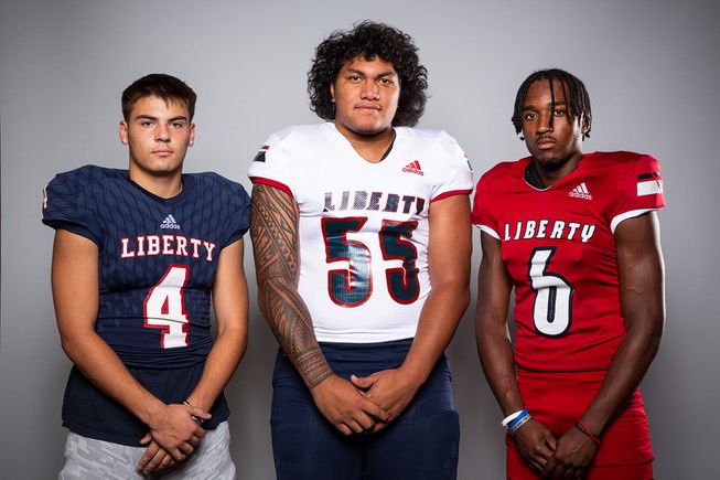 Members of the Liberty High School football team are pictured during the Las Vegas Sun's high school football media day at the Red Rock Resort on July 26, 2022. They include, from left, Colin Gregorio, AJ Fuimaono and Ethan Hilliard.