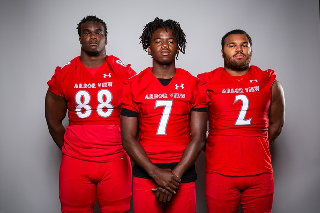 Members of the Arbor View High School football team are pictured during the Las Vegas Sun's high school football media day at the Red Rock Resort on July 26, 2022. They include, from left, Zurich Ashford, Michael Kearns and Juice Washington.