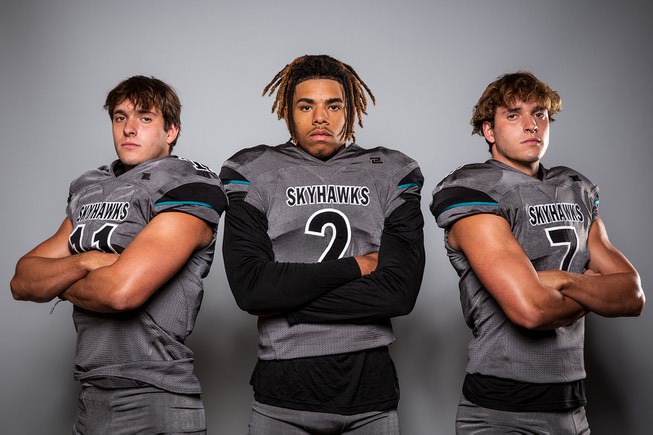 Members of the Silverado High School football team are pictured during the Las Vegas Sun's high school football media day at the Red Rock Resort on July 26, 2022. They include, from left, Brandon Tunnell, Donavyn Pellot and Bryson Tunnell.