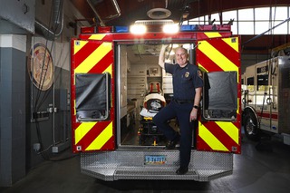 City of Henderson Deputy Chief Scott Vivier poses on a rescue unit at Fire Station #82 in Henderson Wednesday, Aug. 17, 2022. The city offers LifeRide Ambulance Membership plans that will cover the cost of two ambulance rides for emergency purposes per year.