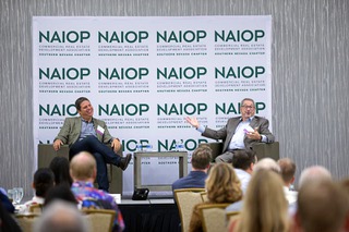 Josh Swissman, left, founding partner of The Strategy Organization, and Alan Feldman, a distinguished fellow at UNLVs International Gaming Institute, speak during a NAIOP Southern Nevada breakfast meeting at the Orleans Thursday, Aug. 18, 2022. STEVE MARCUS