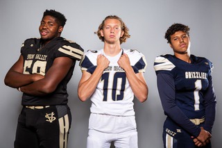 Members of the Spring Valley High School football team are pictured during the Las Vegas Sun's high school football media day at the Red Rock Resort on July 26, 2022. They include, from left, Kelze Howard, Colton Jones and Ti'Shaun Ereaux-Jackson.